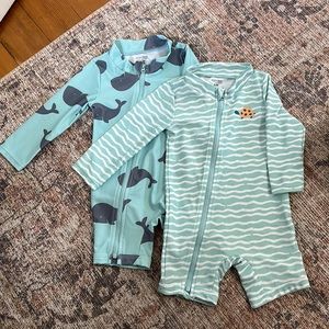 Simple Joys by Carter’s 1-piece Zip Rashguards, pack of 2.